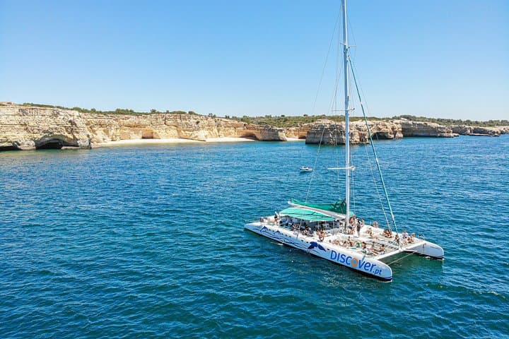 Half Day Sailing Cruise by Catamaran to Benagil and Carvoeiro