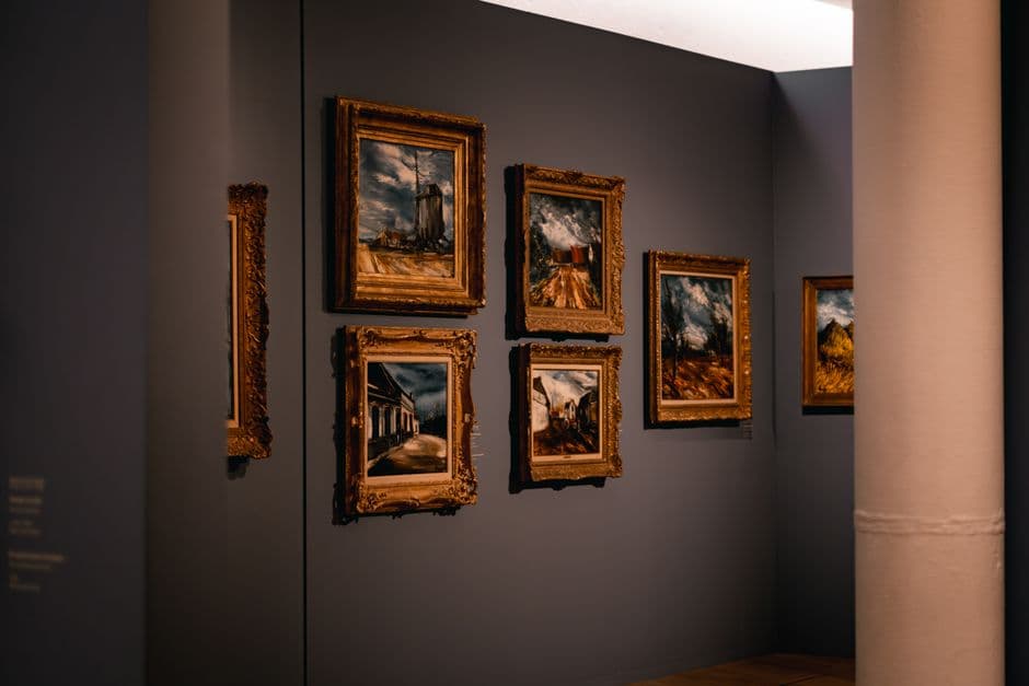 Art exhibition featuring landscape paintings on display at Museu Municipal de Faro, Algarve.
